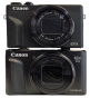 Srovnávané Fotoaparáty Canon stojící na sobě zepředu